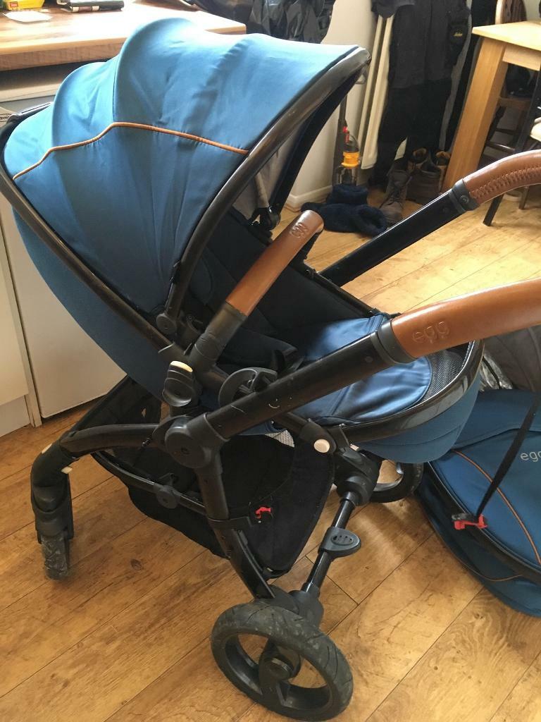 petrol blue egg pram